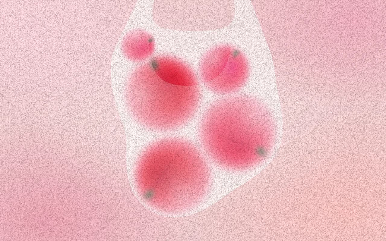 Five soft red-pink peaches inside a milky translucent plastic bag against a blush-pink background.