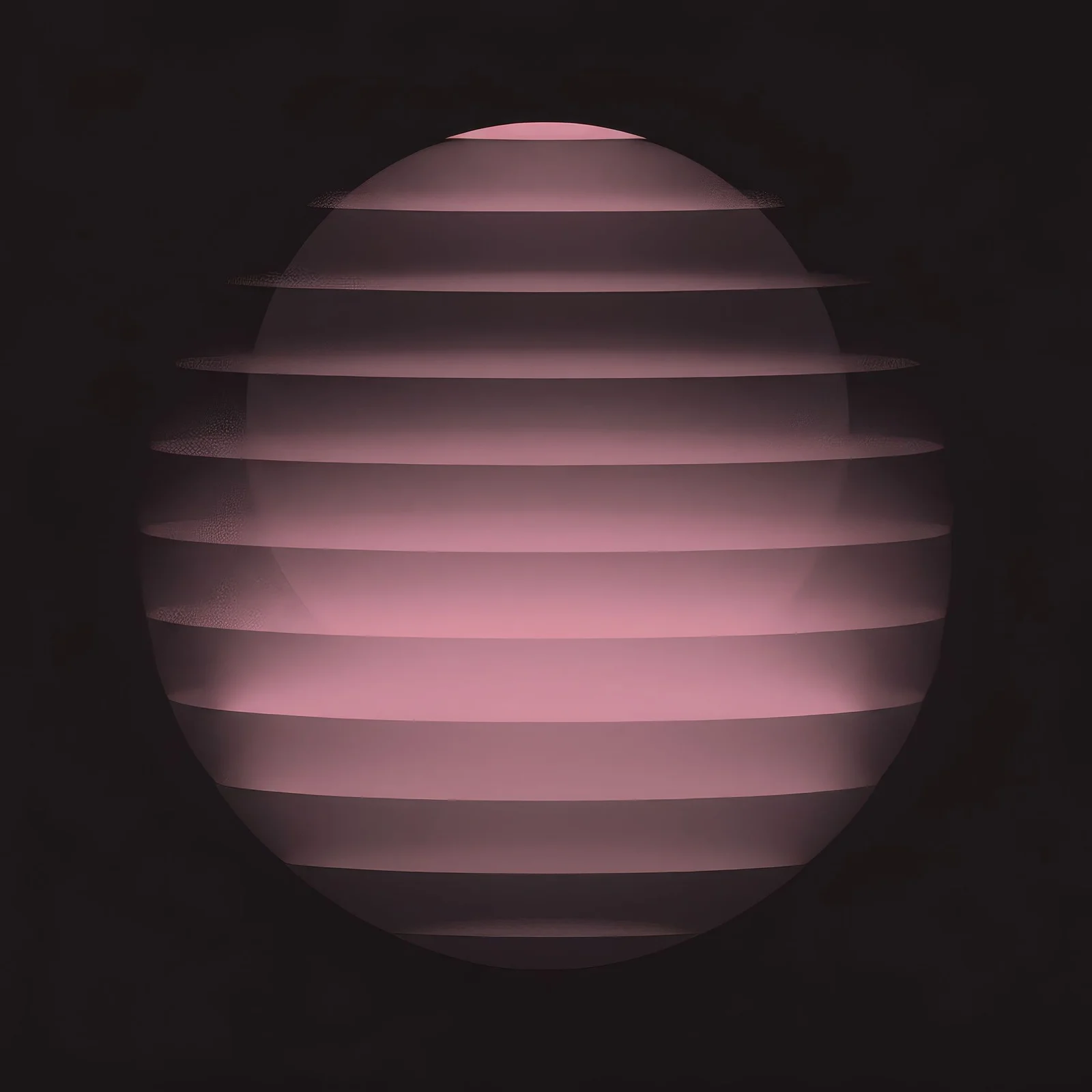A softly lit pink sphere with horizontal slices